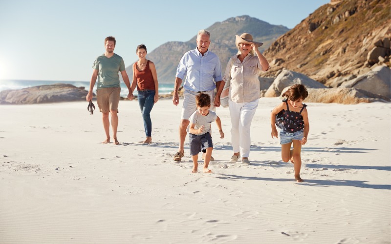 multi-generational family on beach